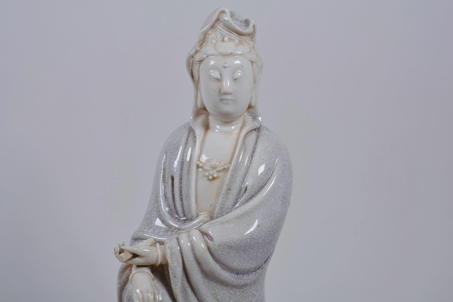 A Chinese crackle glazed blanc de chine Quan Yin, impressed seal marks verso, 12" high - Image 9 of 9