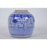 A Chinese blue and white dry storage jar, decorated with stylised flowers and geometric bands,