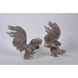 A pair of models of fighting cockerels, 9" high
