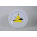 A Russian propaganda style porcelain cabinet plate, decorated in the Suprematist style after