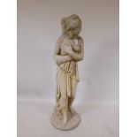 A concrete garden figure of a classical nude woman, 47" high