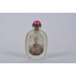 A Chinese reverse decorated snuff bottle depicting a Chinese military gentleman, inscription