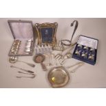 A quantity of silver plated wares including a boxed set of napkin rings and menu holders, boxed