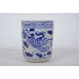 A Chinese blue and white porcelain brush pot decorated with a phoenix, 4½" high