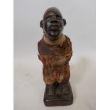 An African Congo fetish figure, carved wood, 8" high x 3" wide