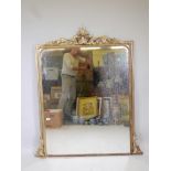 A Victorian giltwood overmantle mirror, 50" x 58"