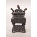 A large Chinese bronze censer and stand with two handles and all over bamboo decoration, 21" high,