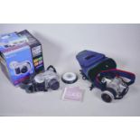 A Canon EOS 300 digital camera with Canon 28-90mm zoom lens, together with a Sony CD Mavica MVC-