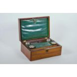 A Victorian rosewood dressing table/writing case, with inlaid mother of pearl to the cover, and with