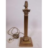 A large brass Corinthian column with doric capital lamp stand, 19" high x 6" wide