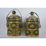 A pair of metal rice pots and covers with pierced and embossed gilt banded decoration, 14" high