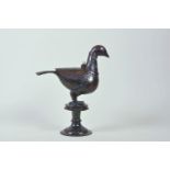 An Islamic bronzed metal censer in the form of a bird, 9" high