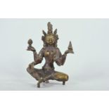 An Indian bronze figure of Shiva seated in meditation, 7" high