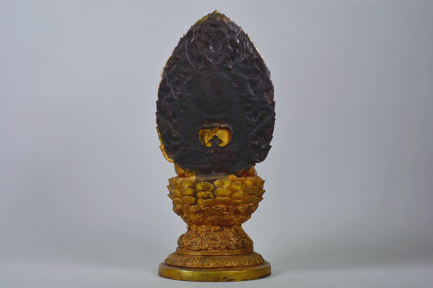 A large Chinese gilt metal Buddha seated on a lotus throne, impressed 4 character mark to base, - Image 2 of 7
