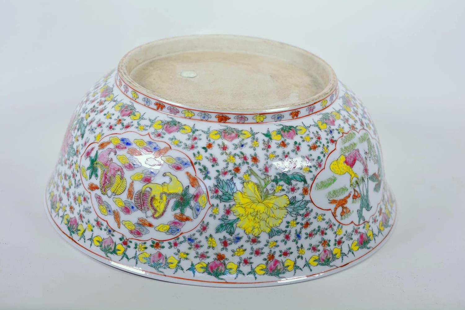 A large Chinese porcelain bowl decorated with deer, mythical beasts and flowers in bright enamels, - Image 8 of 9