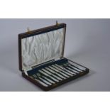 A James Dixon & Sons Edwardian silver plated set of cake knives and forks with mother of pearl