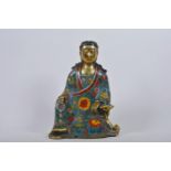 A Chinese bronze and cloisonné enamel Buddha, 6 character mark to the back, A/F, 10" high