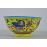 A Chinese polychrome porcelain rice bowl with fo dog decoration, 6 character mark to base, 6"
