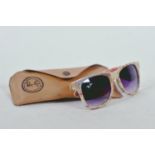 A pair of vintage Rayban 'Wayfarer' sunglasses in case