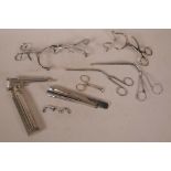 A bag of various stainless steel medical instruments