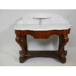 A Victorian burr walnut shaped front washstand, with carrera marble top and single frieze drawer,