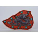 A Tibetan wall hanging decorated with agate, coral and turquoise beads, 13" x 8"