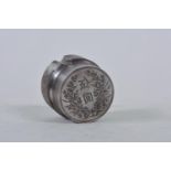 A coin stamp die, 1½" x 2"