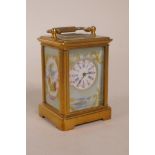 A miniature brass cased carriage clock with porcelain panels decorated with flowers and exotic