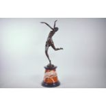 An Art Deco style bronze of a dancing girl, with a Paris foundry stamp, 25" high