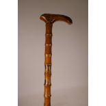 A vintage Chinese bamboo walking stick decorated with calligraphy and landscape, picture 34" long