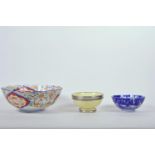 An Imari porcelain fruit bowl with traditional decoration, 9½" diameter, together with two smaller