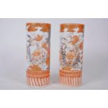 A pair of Meiji Japanese satsuma cylinder vases with bird and flower decoration, marks to base, A/