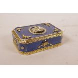 An enamelled gilt metal trinket box with crown and cubic zirconium inset decoration, 3½" x 2½"