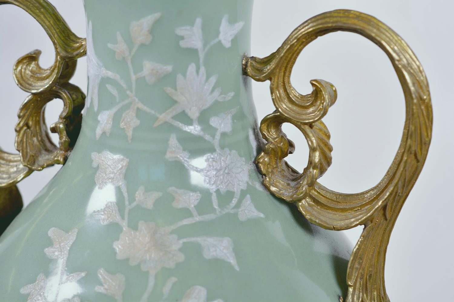 A Chinese celadon glazed porcelain vase with ormolu style mount and raised floral decoration, seal - Image 6 of 13