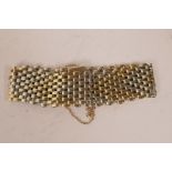 A 9ct gold bi-colour brick link bracelet, 37.8 grams