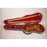 A small violin, 22½" long, with bow, in associated case