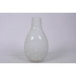 A studio overlay glass vase with scroll decoration, 8½" high, A/F
