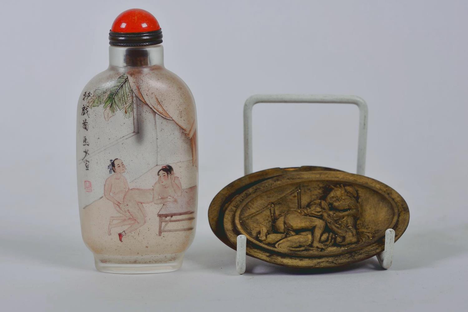 A Chinese erotic reverse decorated snuff bottle together with a Japanese shunga carved boxwood