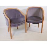 A pair of contemporary tub chairs, with reeded beechwood frames