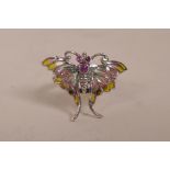 A silver and plique-a-jour dress ring in the form of a butterfly, size 'P/Q'