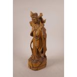 A Chinese carved hardwood figure of Quan Yin, 14½" high
