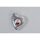 A 925 silver heart shaped vesta case with an enamel plaque depicting a bathing nude, 1½" high