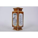 A Chinese square section porcelain vase decorated with panels of figures and calligraphy, 7½" high