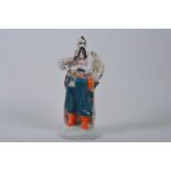 A 1970s Soviet Polonne porcelain figure of 'Taras Bulba', a Ukrainian Zaporozhian Cossack, stamped