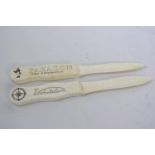 A pair of bone letter openers, 9" long