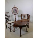 A 1930s walnut occasional table with well figured top raised on cabriole supports, 24" x 18", a