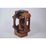A mid C20th hardwood abstract sculpture, in the manner of Brian Wilshire, 11" high