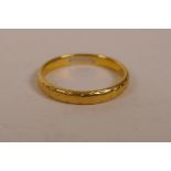 A 22ct gold wedding band, size 'S', 4.3 grams