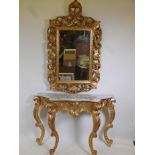 A carved giltwood shaped front console table with a marble top and matching mirror, 48" x 16", 32"