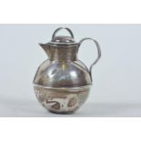 A sterling silver milk/cream small jug, hallmarked William Griffiths and Sons, Birmingham 1906,